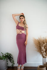 Purple midi dress with midriff cutouts.