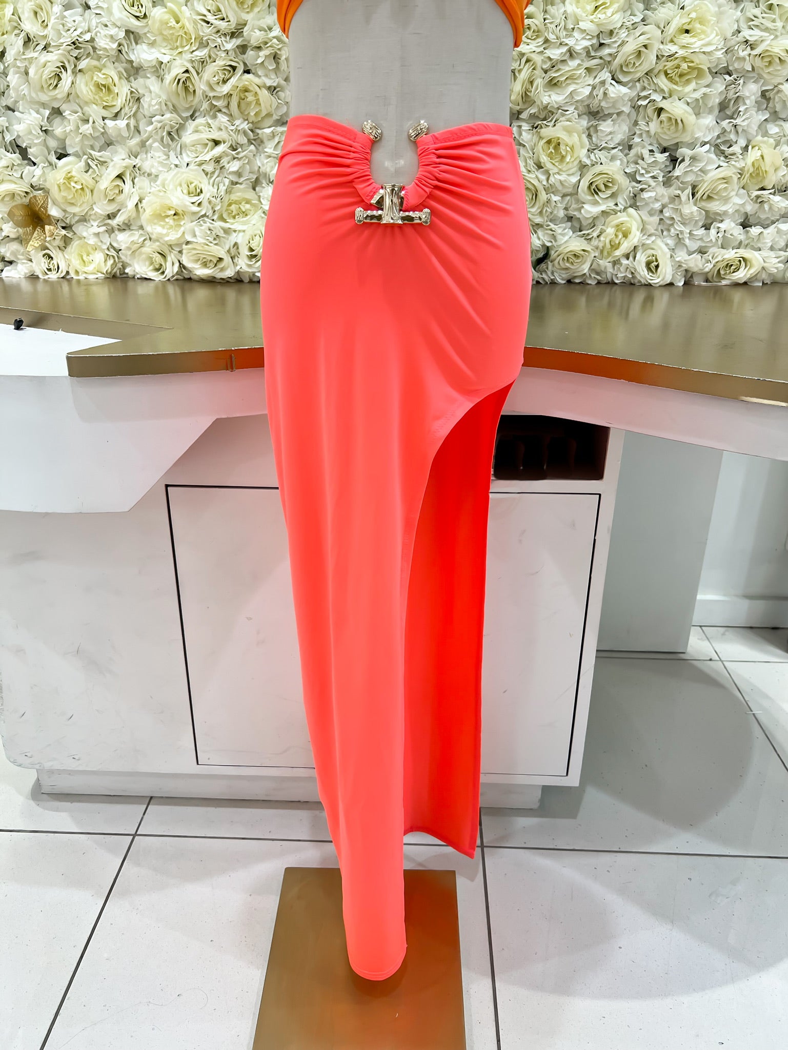 Orange/ pink midi skirt with high slit.