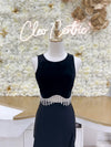 Black tight muscle tank in velvet and hanging rhinestones.