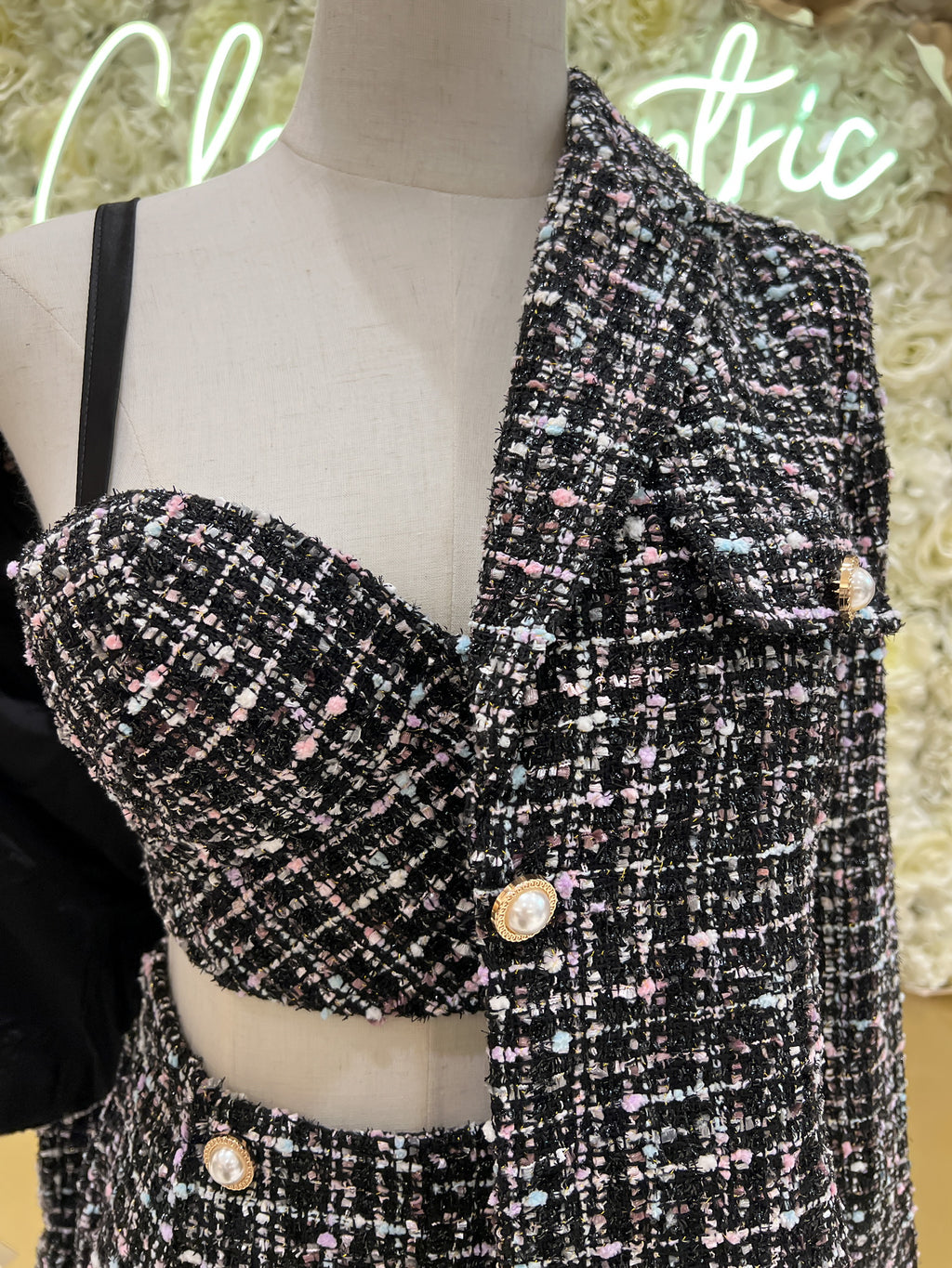 Black tweed blazer with matching tweed high waisted shorts and a tweed push up bustier.