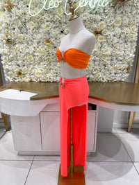 Orange/ pink midi skirt with high slit.