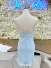 Lace mini dress with a sheer midriff in blue.