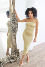 Gold strapless midi dress with rhinestones and pearls. 
