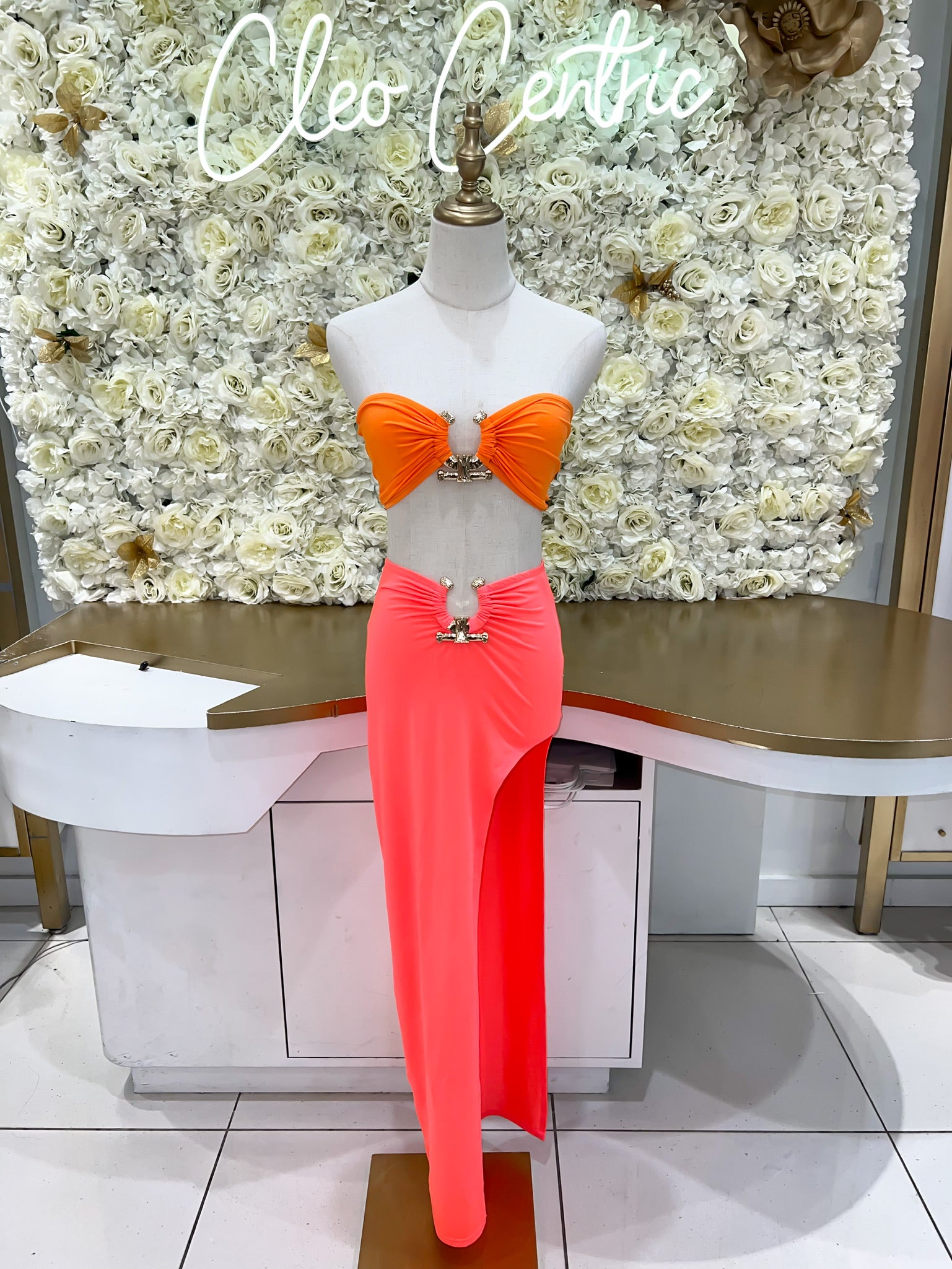 Orange/ pink midi skirt with high slit.