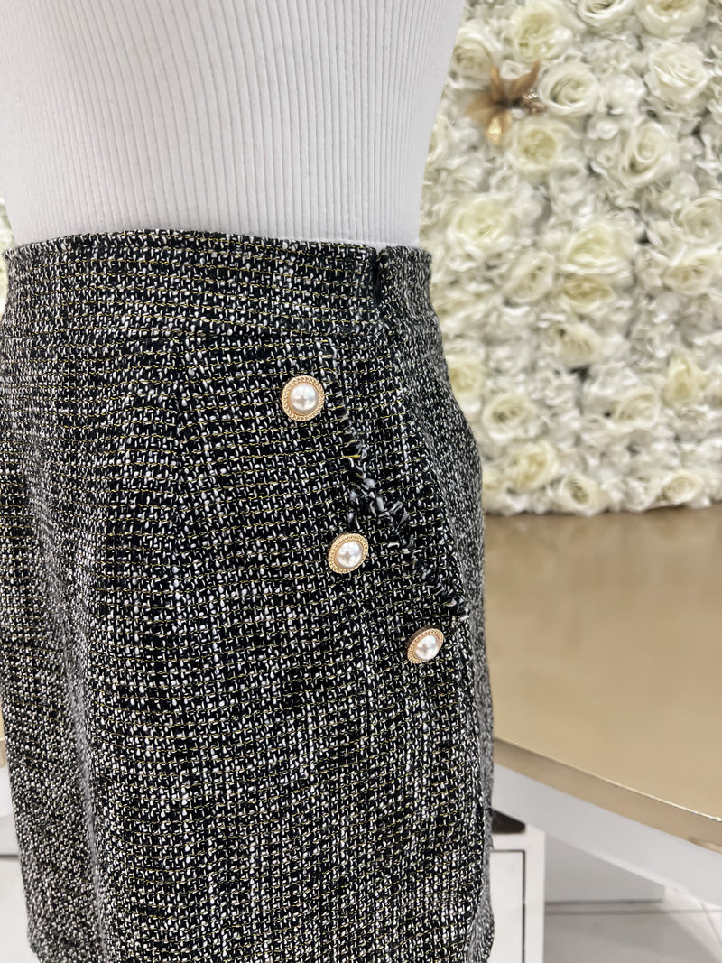 Tweed skirt with matching tweed jacket.